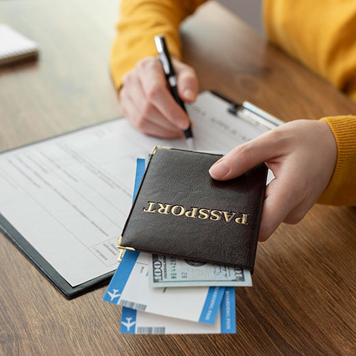 Applicant preparing for international travel with passport and boarding passes, assisted by a global recruitment agency to secure overseas job opportunities